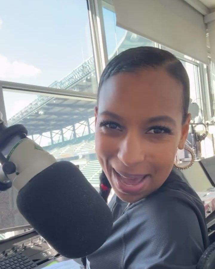 Chelsea at the PA mic in the Truist Park press box