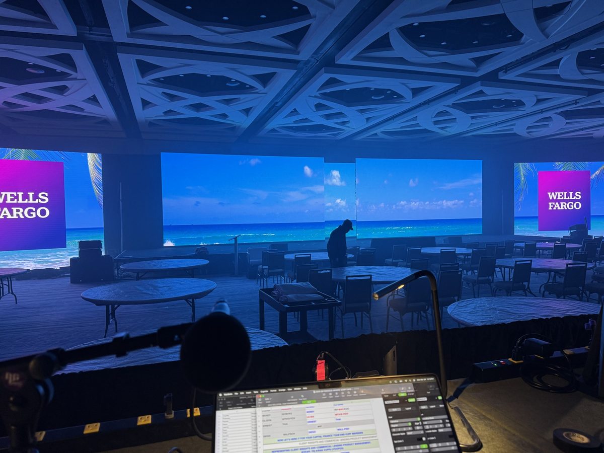 The view of a Wells Fargo ballroom from the Live Voice MC booth before doors open